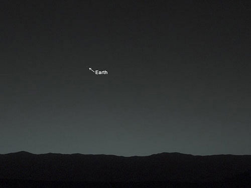 NASA's Curiosity rover on red planet has snapped its first view of Earth from the surface of Mars. Photo courtesy:  twitter.com/MarsCuriosity