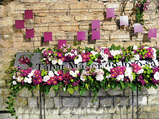 Beauty in every corner: A shop sign and a roadside cafe are bedecked with beautiful floral arrangements during the Temps de Flors. PHOTOS BY AUTHOR