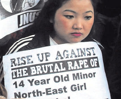 Protest against the rape of a Manipuri teen outside the Vasant Vihar police station in New Delhi. DH PHOTO
