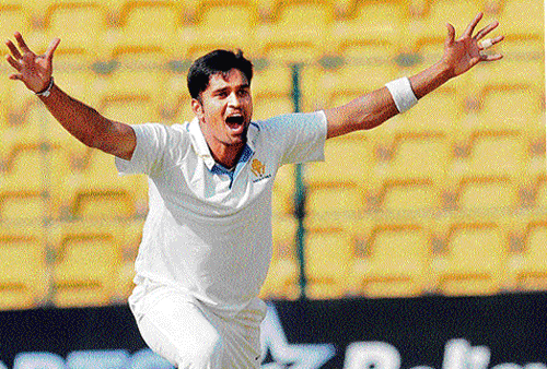 war cry: Vinay Kumar appeals successfully for a wicket. dh photo/ srikanta sharma r