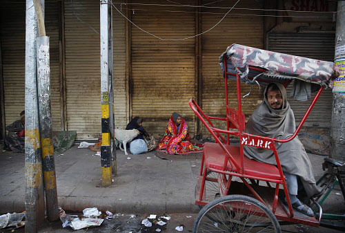 Ten more homeless have succumbed to cold since February 1 in north Delhi's Kashmere Gate area. Lack of funds, which hinders the process of setting up and running night shelter for destitutes, also remains the major cause for apathy towards them. AP File Photo. For Representation Purpose
