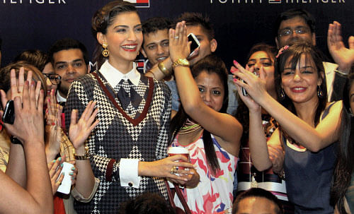 Bollywood actress Sonam Kapoor with fans during an inaugural function of a showroom in Chandigarh on Friday. PTI Photo