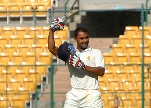 Ranji Trophy champions Karnataka batted themselves into a winning position in the Irani Cup game against Rest of India as they built a massive first innings lead of 189 runs, courtesy a swashbuckling run-a-ball unbeaten century by Stuart Binny here Monday. DH