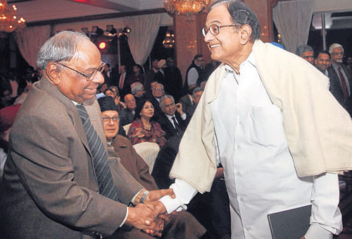 Finance Minister P Chidambaram and Prime Minister's Economic Advisory Council Chairman C Rangarajan at the launch of a book "Transforming our Cities" written by Isher Judge Ahluwalia at a function in New Delhi on Monday.  PTI