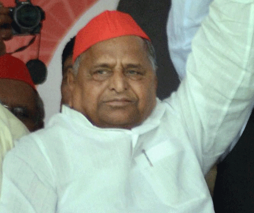 The Samajwadi Party chief Mulayam Singh Yadav on Tuesday again targeted the BJP prime ministerial candidate Narendra Modi accusing him of spreading 'lies' about development in Gujarat and warned the CM against  'snatching' the land  of  Sikh community in Gujarat. PTI File Photo