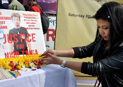 People in Guwahati paying tributes to Arunachal student Nido Taniam killed in Delhi recently, on Sunday. PTI Photo