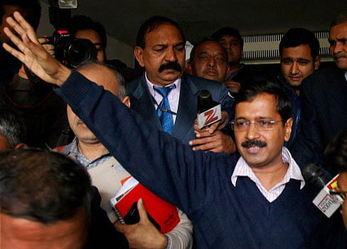 Delhi Chief Minister Arvind Kejriwal waves after addressing a press conference in New Delhi on Tuesday. PTI Photo