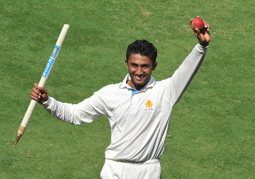 Resuming the day at 114 for three, Rest of India offered tepid resistance against rookie leg-spinner Shreyas Gopal picked up four wickets, including a hat-trick for a match haul of 5 for 35.  DH photo of Shreyas Gopal