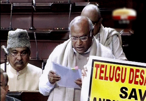Railways Minister Mallikarjun Kharge presenting the interim rail budget in the Lok Sabha amid protest by TDP members during the extended winter session in New Delhi on Wednesday. PTI Photo