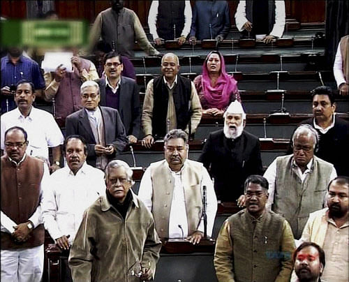 Members in the Lok Sabha during the extended winter session in New Delhi onThursday. PTI Photo / TV GRAB