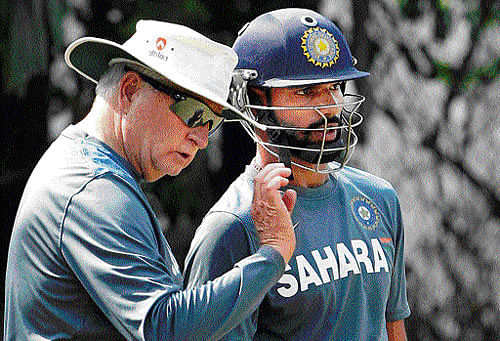 making a point: Shikhar Dhawan, seen with coach Duncan Fletcher, will be keen to build on his ton in the first Test.