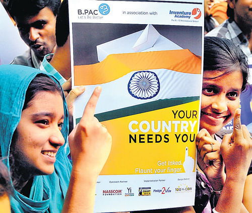 First-time voters at the launch of the 'Get Inked. Flaunt your finger' campaign organised by BPAC in  Bangalore on Thursday. DH Photo