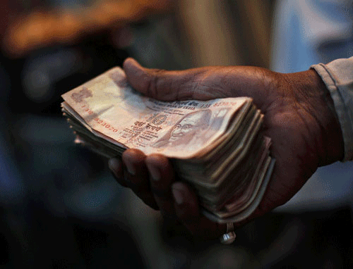 The rupee recovered by 14 paise to 62.28 in early trade today at the Interbank Foreign Exchange market on dollar selling by exporters and increased capital inflows. Reuters file photo