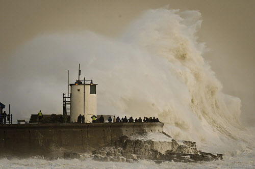 Yet another Atlantic storm was barreling towards Britain today, threatening to dump a month's worth of rainfall on communities already struggling to cope with the wettest winter for 250 years. AP photo