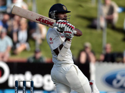 Shikhar Dhawan plays a shot against New Zealand during the first innings on day one of the second international test cricket match at the Basin Reserve in Wellington, February 14, 2014. REUTERS
