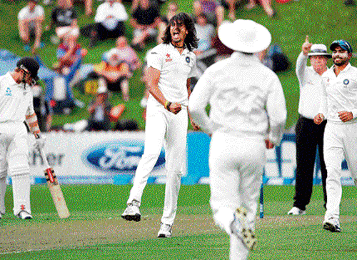 war cry: Ishant Sharma celebrates the fall of a New Zealand wicket in the second Test in Wellington on Friday. AFP