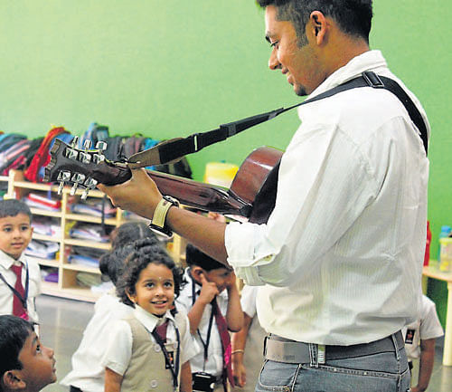 Ashish Palanna teaches music at a school. DHNS