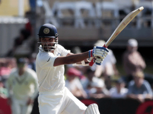 Ajinkya Rahane plays a shot against New Zealand during the first innings on day two of the second international test cricket match at the Basin Reserve in Wellington, February 15, 2014. REUTERS