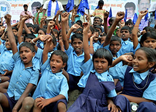 A recent survey conducted by Indian Council of Social Sciences Research (ICSSR) has revealed that 75 per cent tribal children in 22 districts of Rajasthan are lagging behind in education and tribal girls are no more enrolling in schools. DH File Photo. For Representation Only.