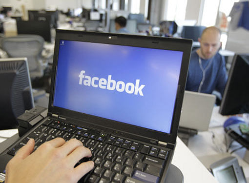 Fewer users may log on through PCs in coming years: Facebook. AP file image