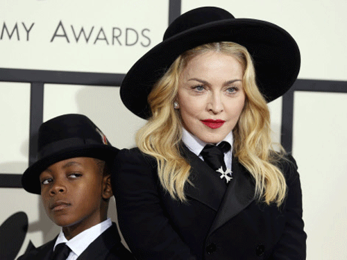 Singer Madonna and son David were recently seen in matching Ralph Lauren suits