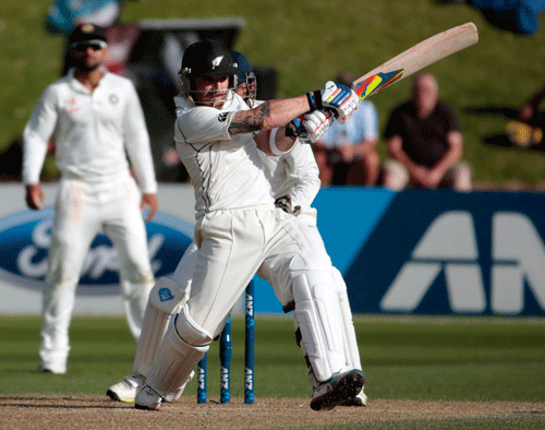 New Zealand's Brendon McCullum plays a shot against India during the second innings on day four of the second international test cricket match at the Basin Reserve in Wellington, February 17, 2014. REUTERS