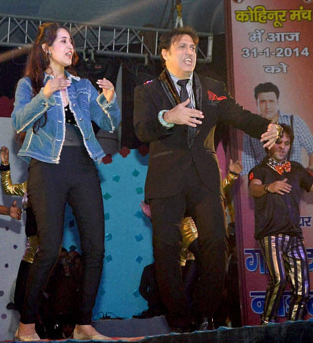 Film actor Govinda performs at a programme in Aligarh on Friday. PTI Photo