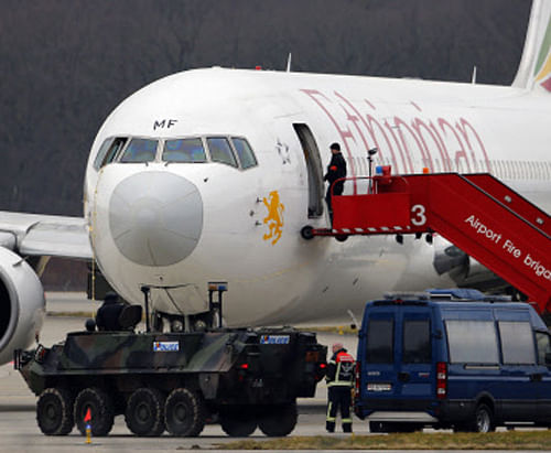 The co-pilot of an Ethiopian Airlines flight hijacked his aircraft today while the captain was in the bathroom and forced it to land in Geneva so he could seek asylum, police said. Reuters Photo