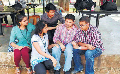 caring: Students like Keshav (second from right) agree that friends are a much-needed support system during  college days.