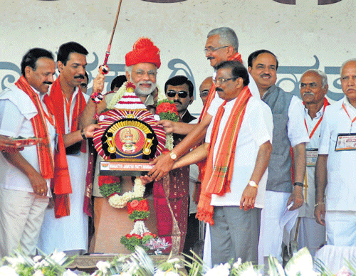 BJP Prime Ministerial candidate Narendra Modi being felicitated in Mangalore on Tuesday.