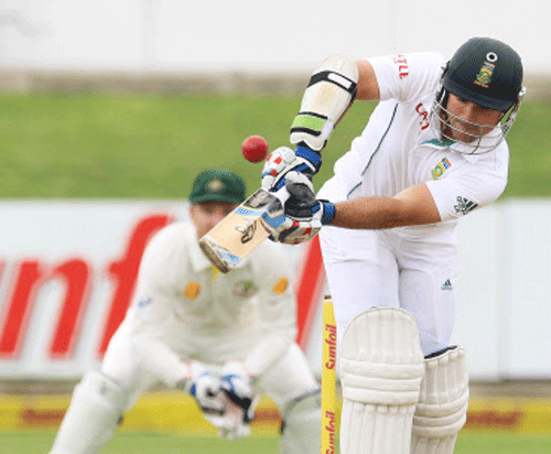 South Africa's batsman Dean Elgar, right, plays a shot as Australia's wicketkeeper Brad Haddin, left, watches on the first day of their 2nd cricket test match at St George's Park in Port Elizabeth, South Africa, Thursday, Feb. 20, 2014. AP Photo