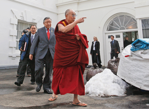 In this Feb. 18, 2010, file photo, The Dalai Lama walks out of the White House in Washington, after meeting with President Barack Obama. Obama will host Tibetan spiritual leader the Dalai Lama for a meeting on Feb. 21, 2014, the White House said, in a move that could rankle already tense relations between the U.S. and China. China on Friday lodged a diplomatic protest with the U.S. and asked it to immediately cancel President Barack Obama's proposed meeting with the Dalai Lama, saying it will cause ''great damage'' to bilateral ties. AP