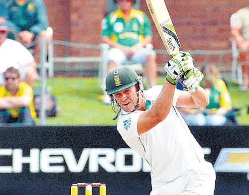 fluent: South Africa's AB&#8200;de Villiers drives en route his 116 against Australia on the second day of the second Test at Port Elizabeth on Friday. reuters