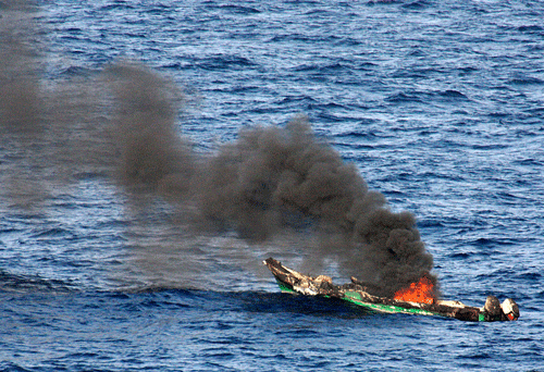 In this Saturday, April 10, 2010 file photo released by the U.S. Navy, a suspected pirates' skiff burns after being destroyed near the amphibious dock landing ship USS Ashland, part of the Nassau Amphibious Ready Group and 24th Marine Expeditionary Unit, at sea in the Gulf of Aden, about 330 nautical miles off the coast of Djibouti. India, which has the largest number of pirates in its custody, is a very important member of the piracy contact group, a senior US official has said. AP