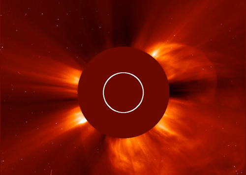 In this Tuesday, Jan. 7, 2014 image made available by NASA, a giant cloud of solar particles, a coronal mass ejection, explodes off the sun, lower right, captured by the European Space Agency and NASA's Solar and Heliospheric Observatory. Don't miss the strongest solar flare of the year that sent out giant bursts of light and radiation into the space. AP