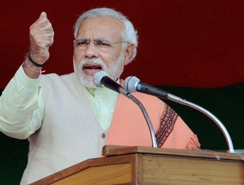 BJP's Prime Ministerial candidate Narendra Modi today said Hindu migrants from Bangladesh must be accommodated in the country and detention camps would be done away with once his party comes to power. PTI File Photo