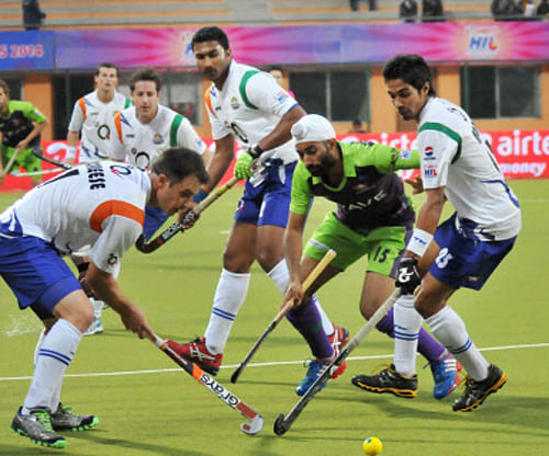 Players of Delhi Waveriders and Uttar Pradesh Wizards in action during their Hockey India League semi-final match in Ranchi on Saturday. PTI Photo