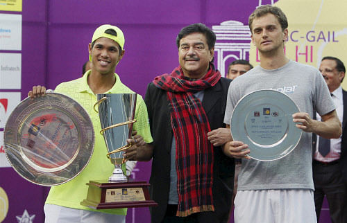 Actor and BJP leader Shatrughan Sinha with Indian Tennis player Somdev Devvarman and Nedovyesov (Kaz) during prize ceremony after the final match of the (Men's Singles) Delhi Open 2014 in New Delhi on Sunday. PTI Photo