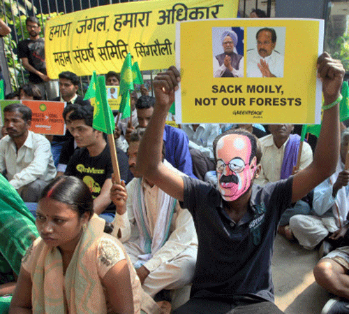 Environmental activists and farmers from Madhya Pradesh hold placards outside the headquarters of Essar Group at a protest in Mumbai last month. They were protesting against what they called the proposed destruction of Mahan forests in Singrauli, Madhya Pradesh, where Essar Power has been allotted a captive coal block. PTI