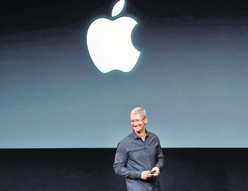 Apple CEO Tim Cook speaks on stage before a new product introduction in Cupertino, California, in this file photo. AP