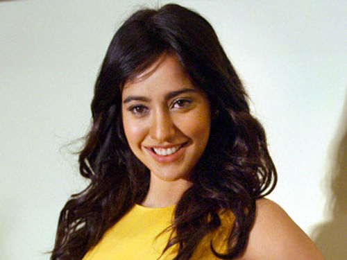 Actress Neha Sharma says the going gets tougher in Bollywood when you're an 'outsider'. PTI Photo
