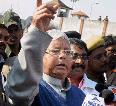 Amid indications that its ally LJP was moving towards BJP, RJD President Lalu Prasad today reached out to Ram Vilas Paswan, saying he should not join 'communal forces'. PTI File Photo