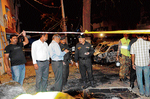 Investigators at the Malleswaram blast site.&#8200;DH file Photo