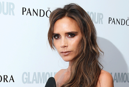 Victoria Beckham was tipped to be designing a kit for her footballer husband David's Miami soccer team, but not anymore. She is said to have been beaten by sportswear giant Adidas. AP photo