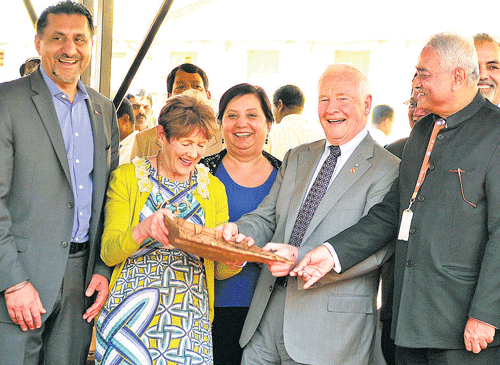 impressed: Governor General of Canada David Johnston and his wife Sharon Johnston appreciate a winnowing fan during their visit to the University of Agricultural Science in the City on Wednesday. (Right) UAS Vice Chancellor K Narayana Gowda is also seen.  dh photo