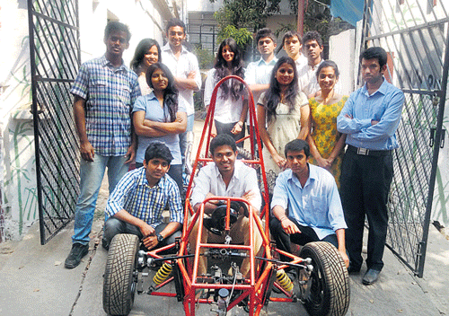 Fourteen students of Nitte Meenakshi Institute of Technology, with  a model of hybrid car they prepared for the Formula Hybrid Competition to be held in the US.