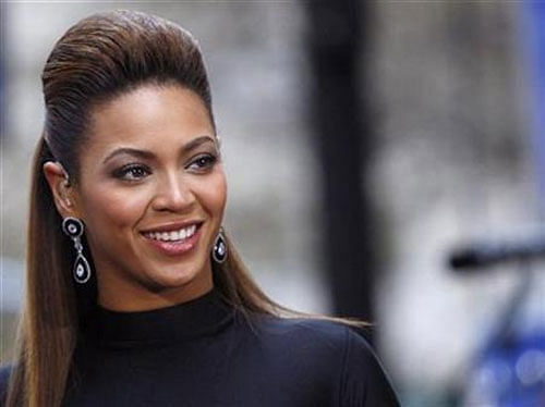 Pop star Beyonce Knowles gave a birthday girl an unforgettable gift by singing 'Happy Birthday' in the middle of her recent Birmingham concert. Reuters File Photo