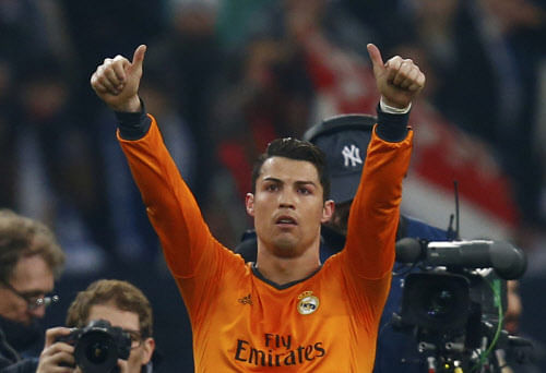 Real Madrid's Cristiano Ronaldo reacts after their Champions League soccer match against Schalke 04 in Gelsenkirchen February 26, 2014. REUTERS