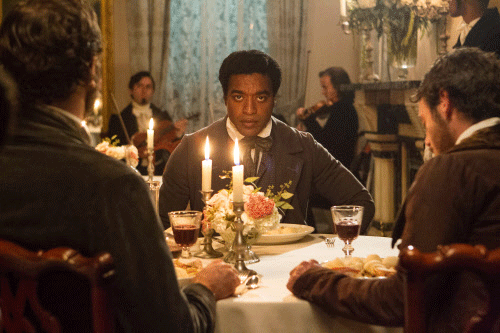 This film publicity image released by Fox Searchlight shows Chiwetel Ejiofor in a scene from '12 Years A Slave.' This year's best picture race at the 86th Academy Awards on Sunday, March 2, 2014, has shaped up to be one of the most unpredictable in years. The favorites are '12 Years a Slave,' 'Gravity' and 'American Hustle.' AP photo
