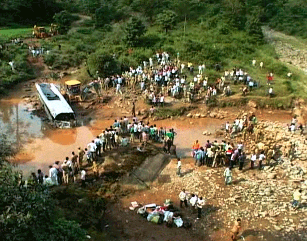 At least 27 school children were injured when a school bus skidded off a culvert and fell into a dry river this afternoon. File photo